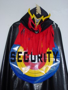 Outfit #2, 2009 / handmade cape, different fabrics, found Mexican wrestling mask - detail view / outfit backside